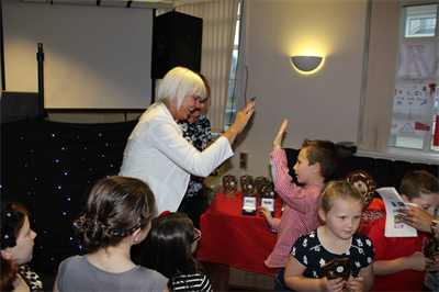 Sallyanne Dowdall Hi-Fiving at Presentation Night - September 2014